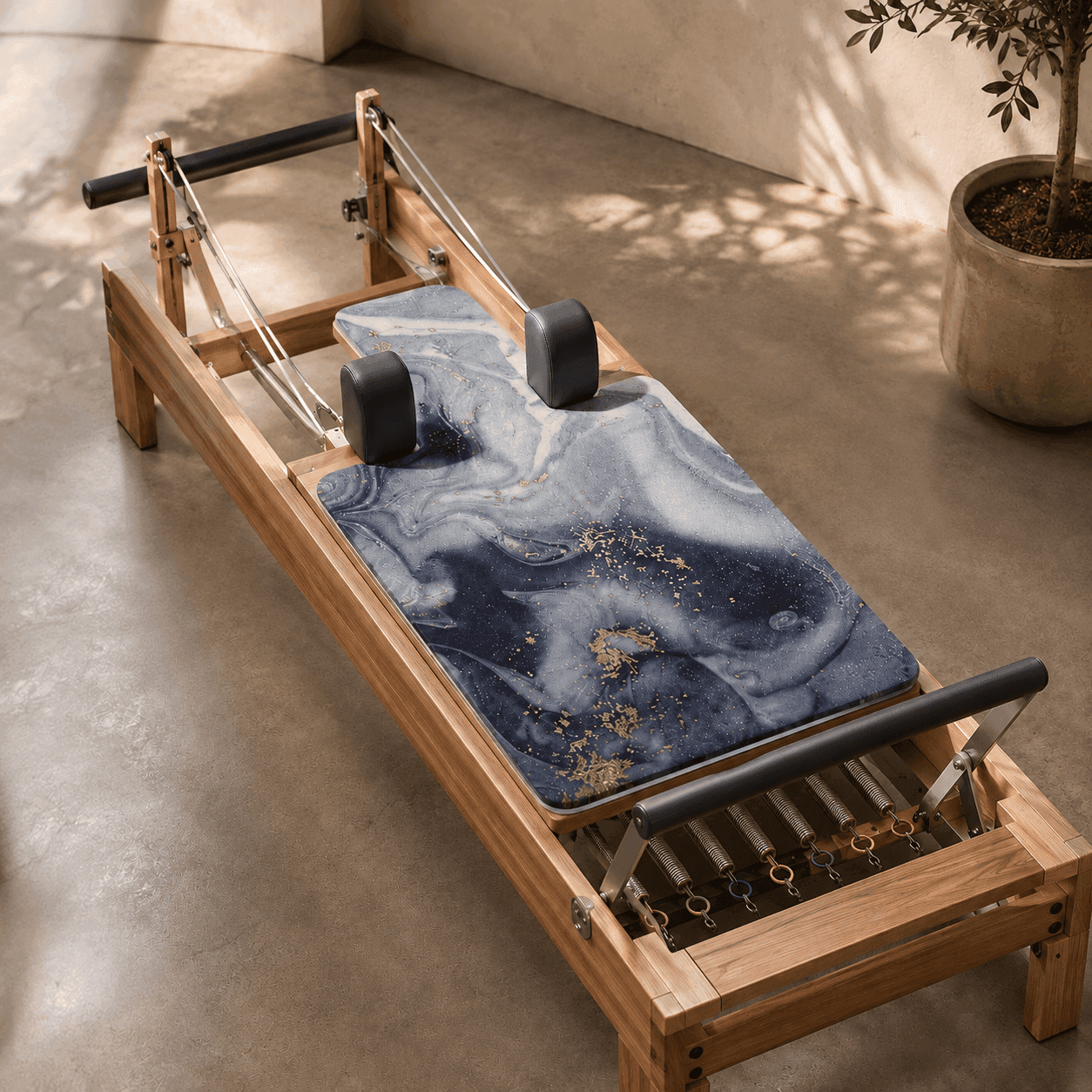 Terra Cotta Echo mat fitted to a wooden Pilates reformer
